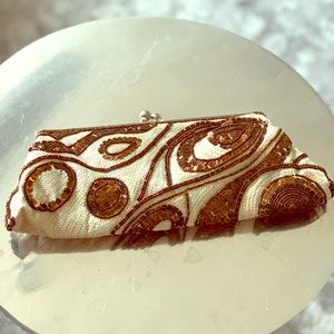 Unique sequined pattern clutch bag